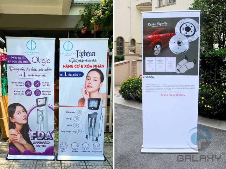 So sánh standee cuốn nhựa hào hoa và cuốn nhôm hào hoa